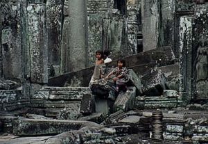 Angkor kids playing on ruins