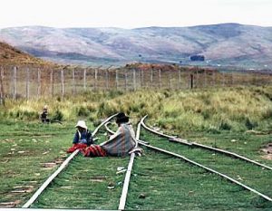 Woman and child on tracks