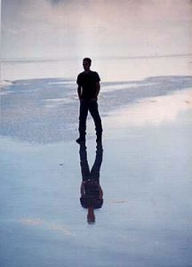 Uyuni Playa Blanca Hotel guy reflected