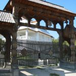 Wooden Gates and Upper Class House