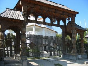 Wooden Gates and Upper Class House