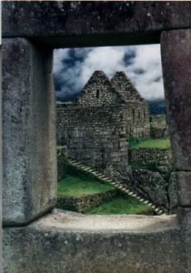 Machu Picchu view through stone window