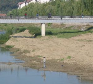 Sighisoara Town Fisherman at Creek