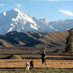 Farmer and mountains