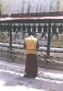 Monk and Prayer Wheels