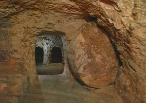 Ancient underground tomb with round door