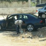 Amman - city scene: car wash