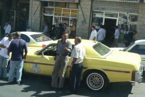 Amman - city scene: old American car