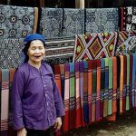 Rural Mai Chau woman & fabrics