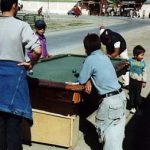 Kids playing pool at Gandam
