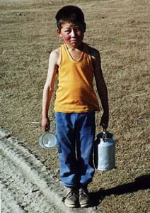 Boy selling mare's milk