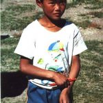 Boy with pen and pad