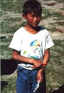 Boy with pen and pad