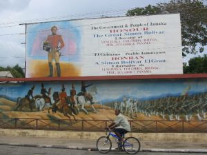 Downtown Kingston - shop with mural of Simon Bolivar of