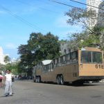 Huge tractor-trailor bus--carries countless people