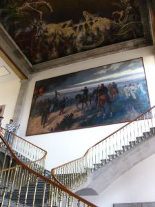 Murals inside Chapultepec Castle depict military events.