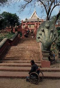 Phnom Penh amputee at temple