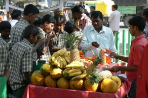 Bangalore - fresh fruit is popular; boys on left wear