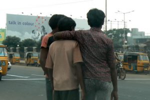 Chennai - good friends watch the taxis called auto-rickshaws. Auto-rickshaw drivers