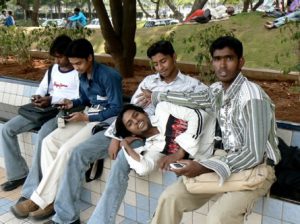 Hyderabad - good friends sitting by Hussain Sagar lake, each