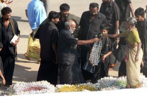 Kanyakumari tourists shop the bazaars. Those in black clothes belong