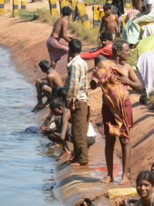 Locals washing in a river in