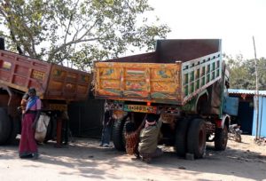 Painted trucks waiting for jobs in