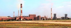 Huge steel plant adjacent to the airport near the ruins