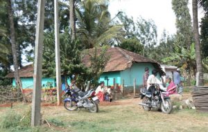 Rural farm house with young motorbike