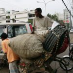 Dhaka - rikshaws often carry more than their own weight