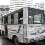 Dhaka - tattered old bus in the central city.