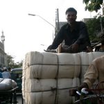 Dhaka - rikshaws often carry more than their own weigh