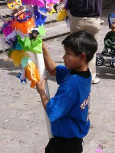 Morelia - boy with festival ornaments