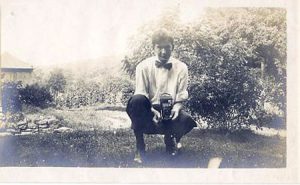 John about twenty years old with camera, 1908