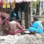 Local residents sort their catch of