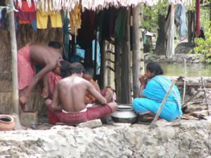 Local residents sort their catch of