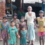 Village elder and kids in the