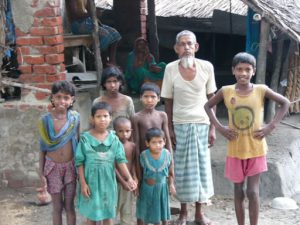 Village elder and kids in the