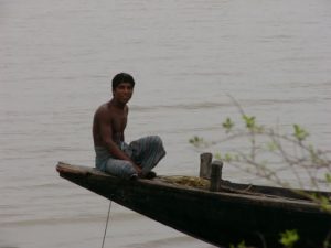 Mongla boat driver waits for business.