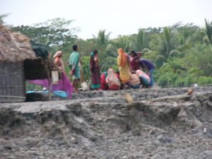 Mongla town scene - colorfully dressed women; my guide suggested