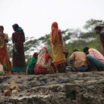 Mongla town scene - colorfully dressed women; my guide suggested