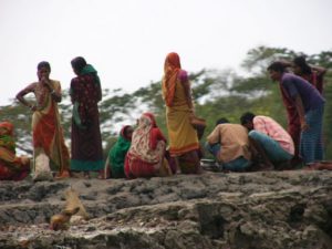 Mongla town scene - colorfully dressed women; my guide suggested