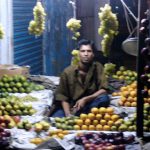 Mongla town scene - fruit stand at night