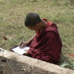Student monk studying