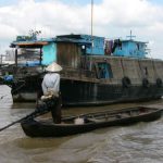 Mekong Delta - people conduct commerce by boat.