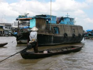 Mekong Delta - people conduct commerce by boat.