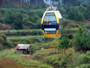 Modern cable car rides over ancient