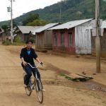 Rural farming village near Dalat - Riding bicycle