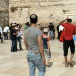 Jerusalem - Western Wall modern guys go to pray