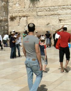 Jerusalem - Western Wall modern guys go to pray